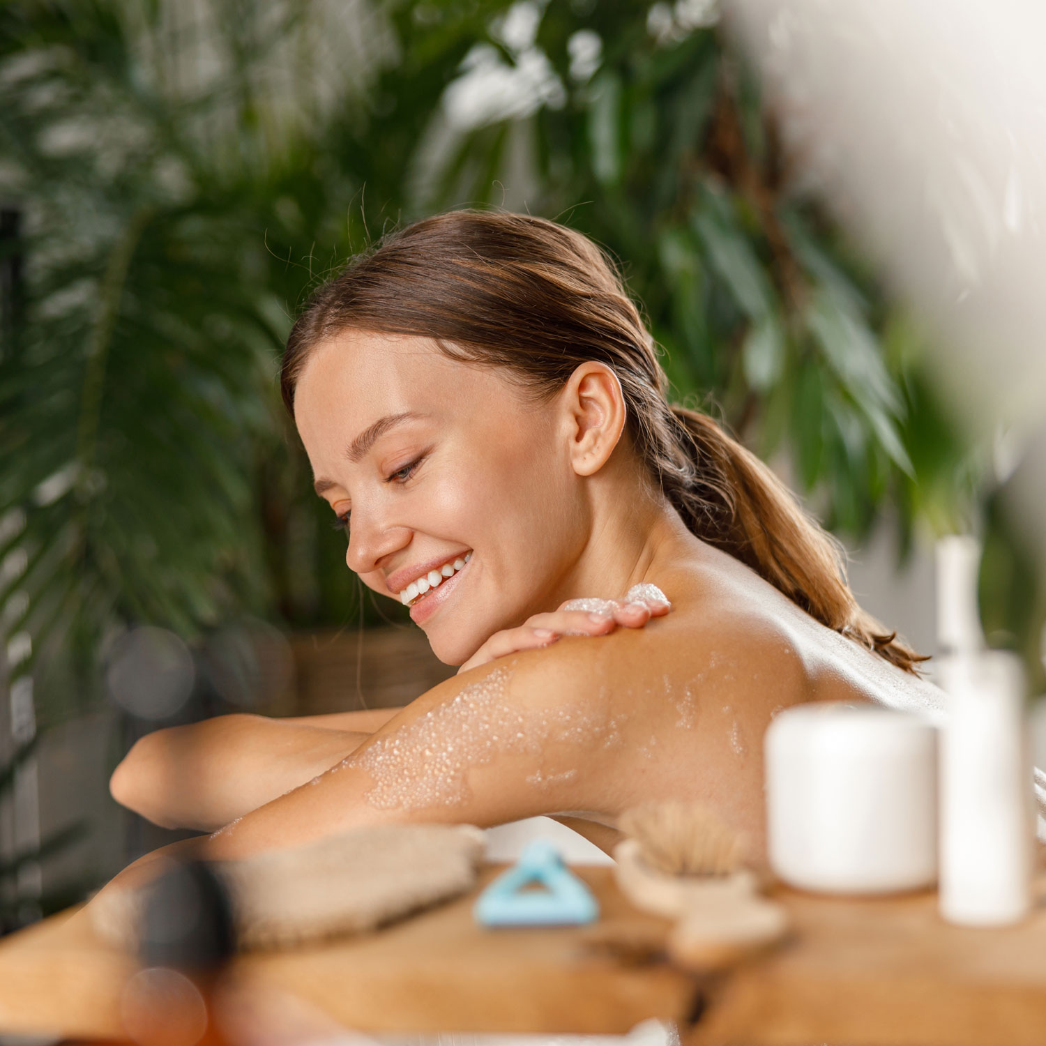 portrait-of-smiling-young-woman-bathing-and-taking-2021-12-11-00-46-46-utc.jpg
